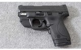 Smith & Wesson ~ M&P 9Shield w/thumb Safety & CTR Green Laser ~ 9mm Para. - 2 of 3