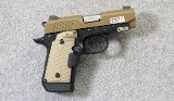 Kimber ~ Micro 9 with Laser Grips ~ 9mm Para. - 1 of 3