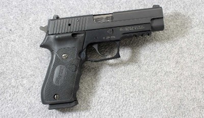 Sig Sauer ~ P220 with Laser Grip ~ .45 ACP - Image 1 of 7
