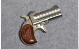 American Derringer Model M-1 45 Colt/.410 Ga. - 1 of 2