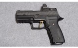 Sig Sauer Model P320 9mm with Leupold Red Dot - 2 of 3