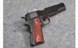 Colt Model 1911 in .45 Auto - 1 of 5