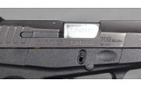 Taurus~709 Slim~9mm Luger - 4 of 6