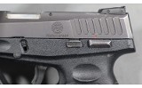 Taurus~709 Slim~9mm Luger - 5 of 6