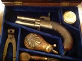 Antique cased London percussion pistol with accessories swivel barrel- 1 of 10