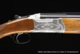 RUGER Red Label
beautifully Hand Engraved by Robert Strosin - 4 of 5