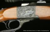RUGER	No.1 with custom engraving	Falling Block Single Shot	.22-250
- 4 of 5