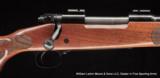 WINCHESTER Moler 70 Featherweight Deluxe 7mm Mauser (7x57mm) - 1 of 5