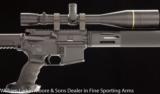 BUSHMASTER XM15-E2S Match rifle 5.56x45 Leupold 6.5x20x50 30mm scope - 1 of 6