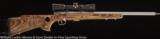 SAVAGE Model 93 BTVS (Brown Laminated, Thumbhole, Varmint ,Stainless) .22WMR Nikon Pro Staff 2x7x32 scope included - 1 of 6