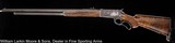 WINCHESTER 1886 .50 Express Deluxe Tribute, 30" .50-110, Tapered oct bbl, Scene engraving by Quigley, Extra fancy wood - 3 of 8