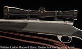 WEATHERBY VANGUARD STAINLESS SYNTHETIC .243 WIN. LEUPOLD 4X12 SCOPE