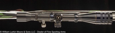 ATKINSON & MARQUART RIFLE CO. CUSTOM REMINGTON 722 .308 CAL, STAINLESS BBL., CAMO SYTHETIC STOCK, WEAVER T10-10X SCOPE - Image 7 of 7