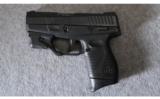 Taurus PT709 SLIM 9MM w/ LaserLyte and Holster - 2 of 2