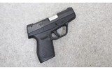 Taurus ~ Model 709 Slim ~ 9mm Luger - 1 of 2