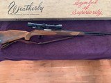 Weatherby Mark XXII 22LR Tube Feed With Weatherby Scope - 1 of 9