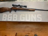 Weatherby MKII 22 LR With Weatherby Scope - 1 of 7