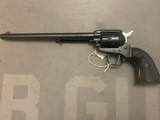 Colt Buntline Scout 9 1/2” Barrel 22LR - 1 of 4