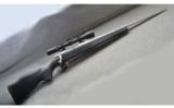 Weatherby Vanguard, Black Synth/Stainless, with Scope - 1 of 7