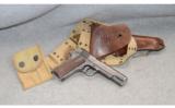 Colt 1011 with US Army Holster and Web Belt - 1 of 4