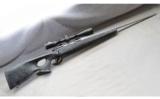 Remington 700 with Synthetic Thumbhole Stock - 1 of 9