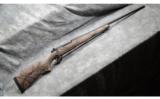 Weatherby ~ Mark V Outfitter ~ 6.5-300 Wby Mag - 1 of 7