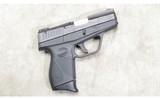 TAURUS ~ 709 SLIM ~ 9MM LUGER - 1 of 4