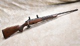 TIKKA ~ M695 RH ~ .338 WINCHESTER - 1 of 11