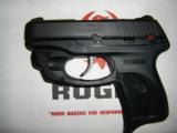 Ruger 3206 LC9 9mm With Laser Max Sight
- 1 of 3