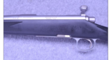 Remington Model 700~ Stainless Synthetic DM ~ .338 Win. Mag. - 13 of 19