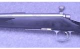 Remington Model 700~ Stainless Synthetic DM ~ .338 Win. Mag. - 14 of 19