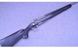 Remington Model 700~ Stainless Synthetic DM ~ .338 Win. Mag. - 1 of 19