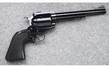 Ruger ~ New Model Super Blackhawk ~ .44 Magnum Cal. - 1 of 2