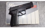 Sig Sauer ~ Model P220 ~ .45 Auto - 1 of 4