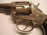 H & R , THE AMERICAN DOUBLE ACTION , .32 ANTIQUE REVOLVER