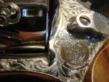 Smith & Wesson model 27-1 Factory engraved Class A scroll
Mint with all boxes - 9 of 14