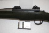 Cooper Model 54 Excalibur 308 Winchester.
Olive green/black composite.
Fluted 22 inch stainless barrel. Excellent - 5 of 8