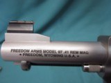 Freedom Arms Model 97 Premier
.41 Mag. Packer Style
3 1/2" Round butt new in box - 4 of 5