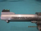 Freedom Arms Model 97 Premier 4 1/4" .22LR. Round butt, Evergreen grips, new in box - 4 of 5