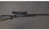 Savage~10~223 Remington - 1 of 14