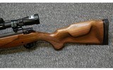 Mossberg~4X4~7 mm Remington Magnum - 5 of 7