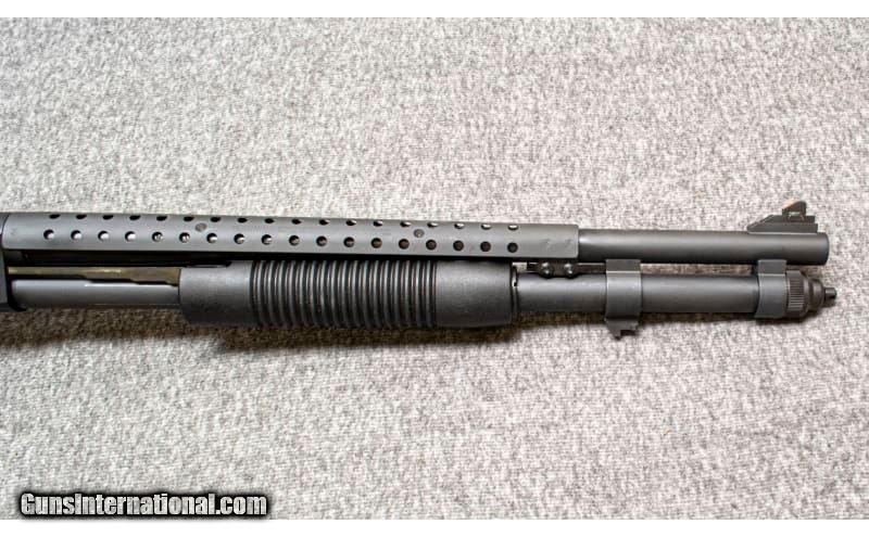 Mossberg~590~12 Gauge