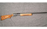Remington~1100~12 Gauge - 1 of 7