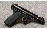 Ruger~Mark IV~22 Long Rifle - 1 of 2
