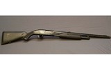 Mossberg~500~12 Gauge