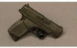 Springfield Armory~Hellcat~9 mm - 2 of 2