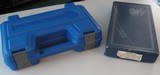 Factory 1981 Box from Smith & Wesson Model 41, and Generic New Blue Plastic Box - 1 of 10