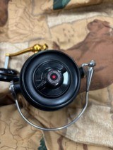 Vintage Penn USA 450SS Skirted Spool Spinning Reel - 5 of 7