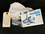 Vintage Penn U.S.A. 850SS Spinfisher Skirted Spool Reel w/ Box, Papers, and Lube  - 2 of 13