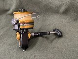 Vintage Penn U.S.A. 850SS Spinfisher Skirted Spool Reel w/ Box, Papers, and Lube  - 4 of 13